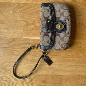 Brown and Black Coach wristlet